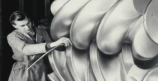 Close-up image of an engineer working on rotors