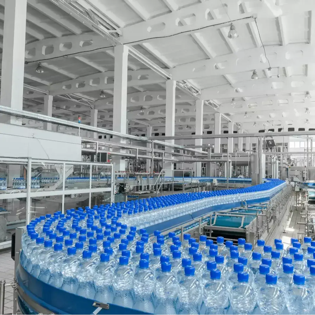 PET bottling plant with bottles on conveyor belt