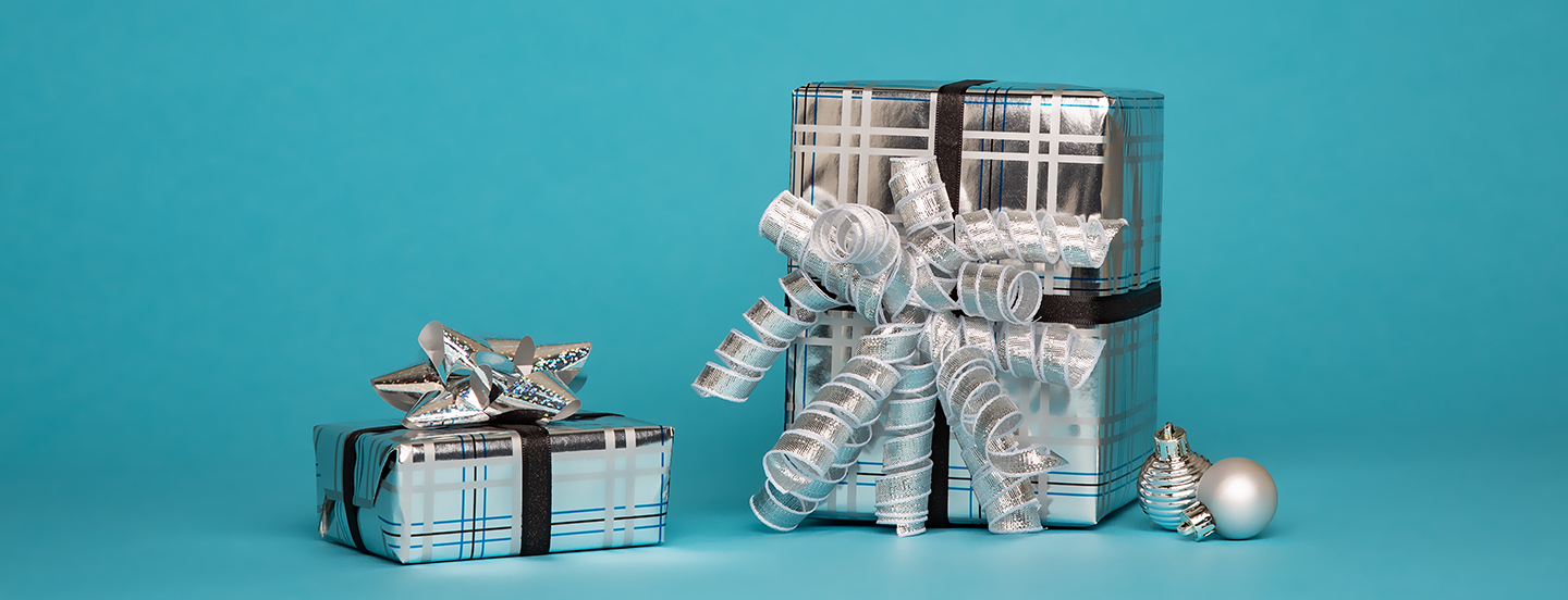 Picture of presents wrapped in platinum wrapping paper